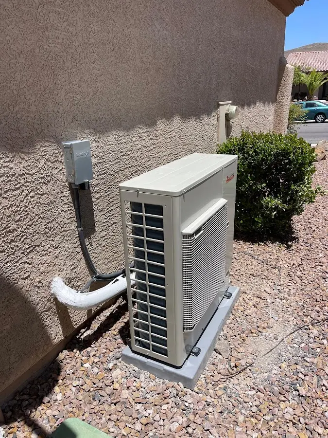 Residential air conditioning condenser unit in Midvale